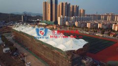 張拉膜結(jié)構(gòu)看臺(tái)的膜材如何選擇？張拉膜結(jié)構(gòu)看臺(tái)怎么維護(hù)保養(yǎng)？